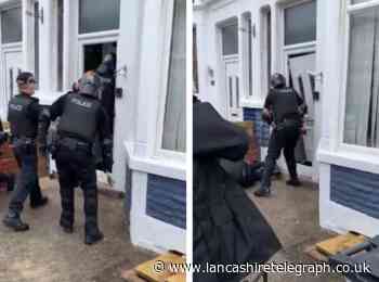 WATCH: Police break down door during heroin and crack cocaine raid
