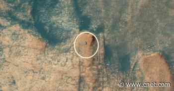 NASA Mars spacecraft snaps amazing image of rover far below     - CNET