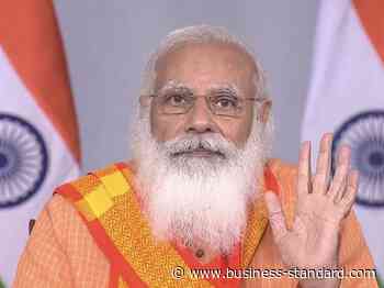 PM bats for doorstep treatment of coronavirus; fights back tears - Business Standard