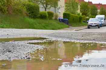 Marode Straßen in Reichenbach: Warum ein ganzes Wohngebiet weiter wartet - Freie Presse