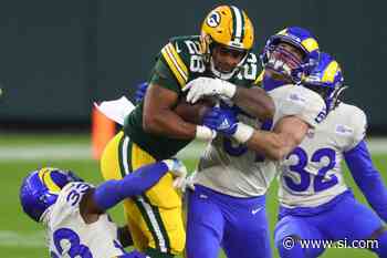 AJ Dillon Showcases Absurd Leg Strength - Sports Illustrated