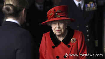 Queen Elizabeth pays tribute to Prince Philip while visiting navy carrier