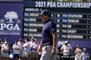 The Latest: Mickelson a Back Nine Away From History at PGA