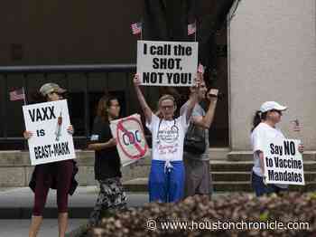 Group protests vaccine mandate for Houston Methodist employees - Houston Chronicle