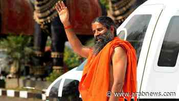 Health minister asks Indian yoga guru to withdraw coronavirus claims - Arab News