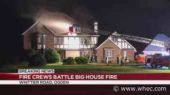 Family escapes house fire in Ogden