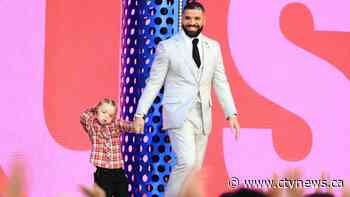 Drake's son appears with him on stage at the Billboard Music Awards