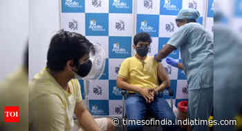 Coronavirus live updates: Over 19.84 crore Covid-19 vaccine doses administered so far, says government - Times of India