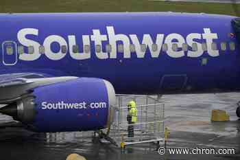 Woman charged with assaulting Southwest flight attendant