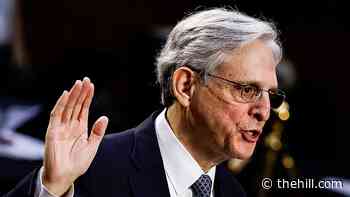 Justice, Garland disappoint Trump critics with memo move