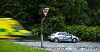 Man taken to hospital after crash closes major Bolton road - Manchester Evening News