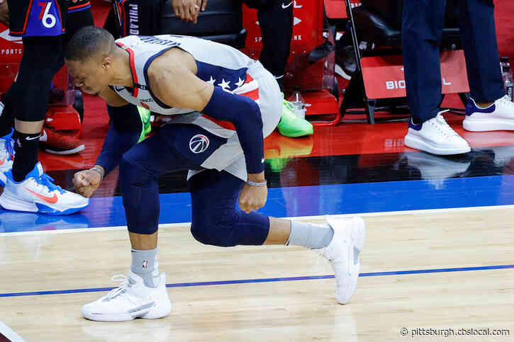 WATCH: Injured Russell Westbrook Has To Be Restrained After Sixers Fan Dumps Popcorn On Him