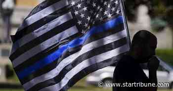 'Thin Blue Line' flag in Bloomington draws complaints from activists