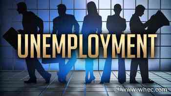 US jobless claims drop to 406,000, another pandemic low