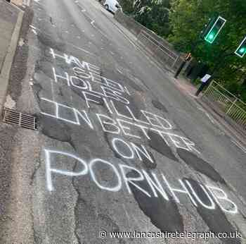 Crude message criticising work on potholes mentions porn site
