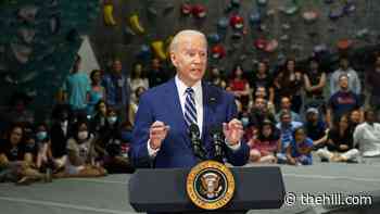 Biden visits rock climbing gym to celebrate end of Va. virus restrictions