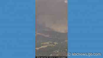 Arizona wildfire destroys homes in remote mining town