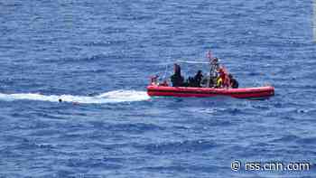 Search resumes for missing people after boat overturns off Florida, leaving 2 dead