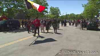 A year after a fire destroyed its building, MIGIZI marches to its new home