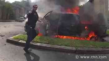 See the moment Austin cops save man from burning truck