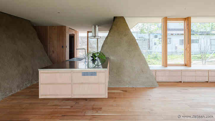 Mounds of surplus soil form walls in Japanese house by ADX