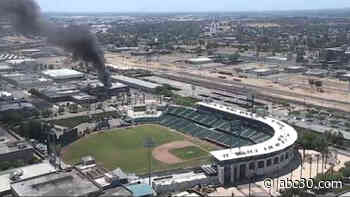 Fire crews battling flames near Chukchansi Park