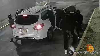 Police release video showing masked gunmen exiting SUV