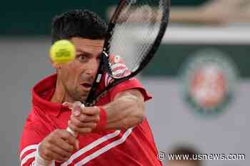 The Latest: Djokovic Improves to 17-0 in French Open 1st Rd