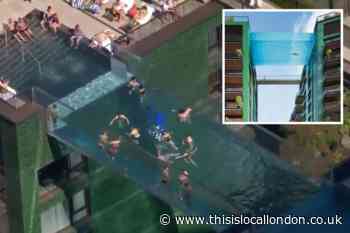 Swimmers take a dip 35 metres above ground in Battersea