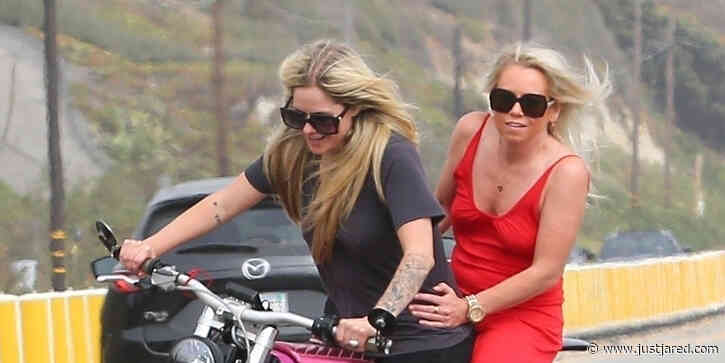 Avril Lavigne Rides A Hot Pink Motorcycle During Memorial Day Holiday