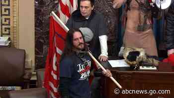 Man who carried Trump flag onto Senate floor pleads guilty in Capitol riot probe