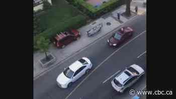 Video captures allegedly stolen SUV barrelling down Toronto sidewalk - CBC.ca
