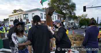 City workers clear George Floyd Square at 38th and Chicago in south Minneapolis