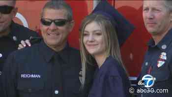 Daughter of firefighter killed in station shooting wears father's jacket to high school graduation