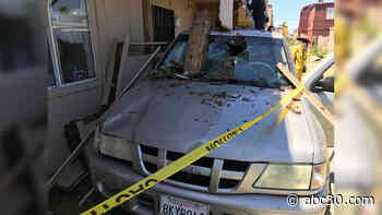 Police searching for driver, passenger that crashed car into Fresno apartment building