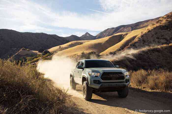2022 Toyota Tacoma Trail Edition 4×4 rolls on lifted suspension and has storage options