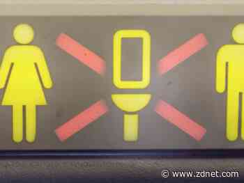 An iPhone cable hung out of the bathroom door. An angry passenger was on the end of it