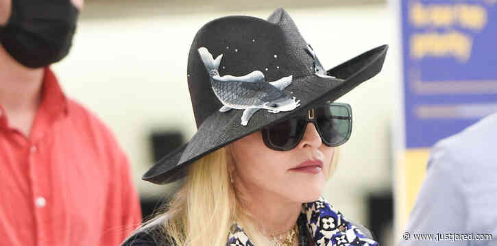 Madonna Wears Fish-Print Hat for Flight Out of NYC