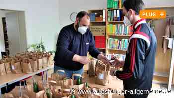 Die Malteser in Neu-Ulm packen Tüten für Menschen in Not