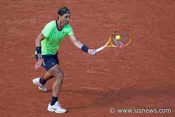 The Latest: Defending Champion Swiatek Into Quarterfinals