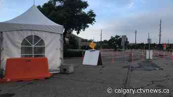 Alberta's first drive-thru COVID-19 vaccine clinic opens in Calgary - CTV Toronto