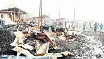 Umuahia timber market burnt as traders clash with Abia State vigilantes - Guardian