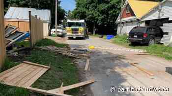 SUV crashes through fences, smashes into garage