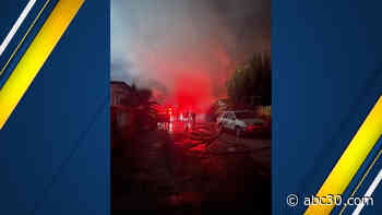 Fire crews battling flames at mobile home park in northeast Fresno