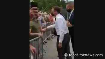 Man slaps French President Emmanuel Macron across the face, video shows