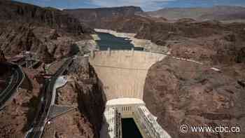 Hoover Dam reservoir hits record low water level amid extreme drought