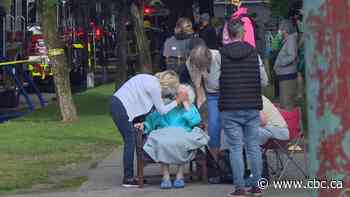 Neighbours come together to carry elderly woman to safety during Vancouver highrise fire