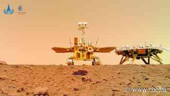Chinese rover and lander pose for portraits on Mars