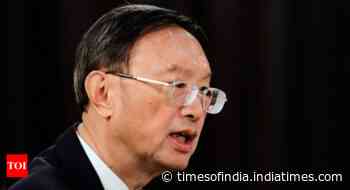 Top Chinese diplomat dismisses Wuhan coronavirus theories as 'absurd story' - Times of India