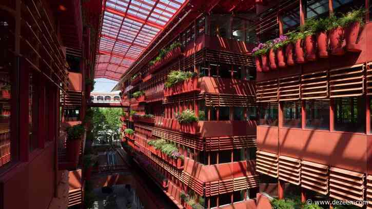 Jean Nouvel unveils bright red covered shopping street in Shanghai